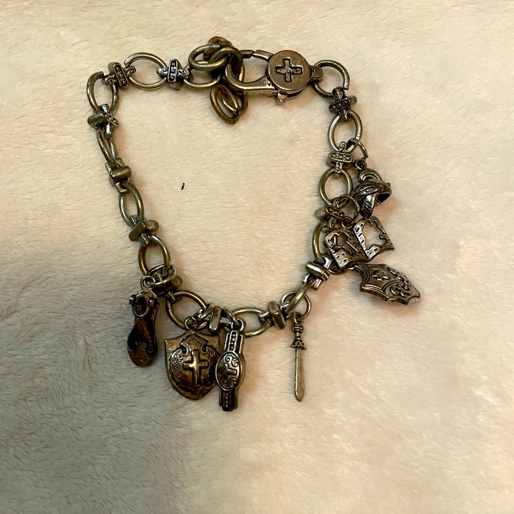 Charm bracelet with cross design, shield, sword etc.